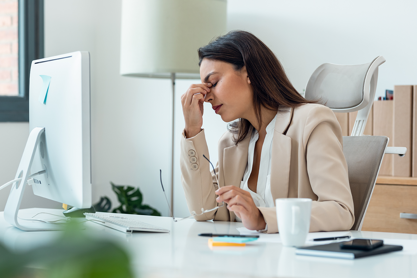 Businesswoman with a headache